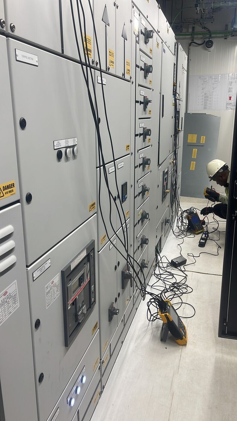 LV switchboard line-up under test with instruments connected